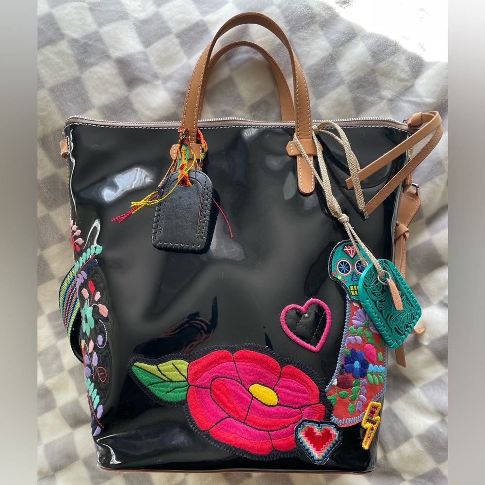 Consuela poppy sling bag